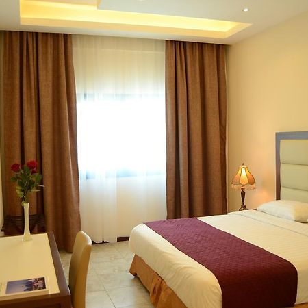שארג'ה Arcadia Hotel Suites מראה חיצוני תמונה