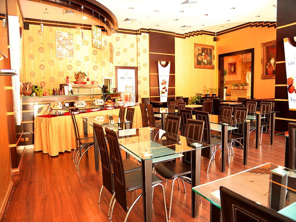 שארג'ה Arcadia Hotel Suites מראה חיצוני תמונה