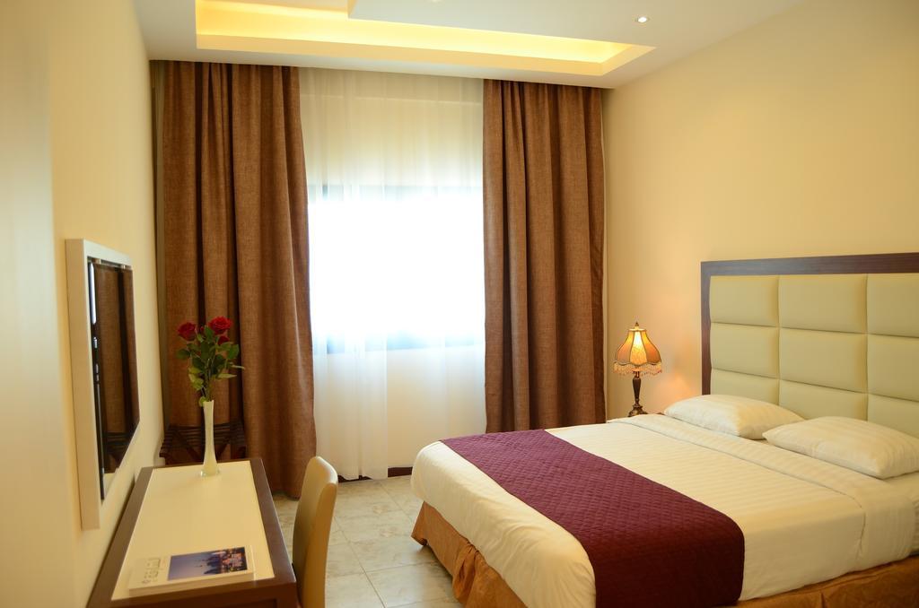 שארג'ה Arcadia Hotel Suites מראה חיצוני תמונה