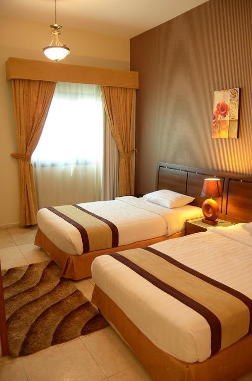 שארג'ה Arcadia Hotel Suites מראה חיצוני תמונה