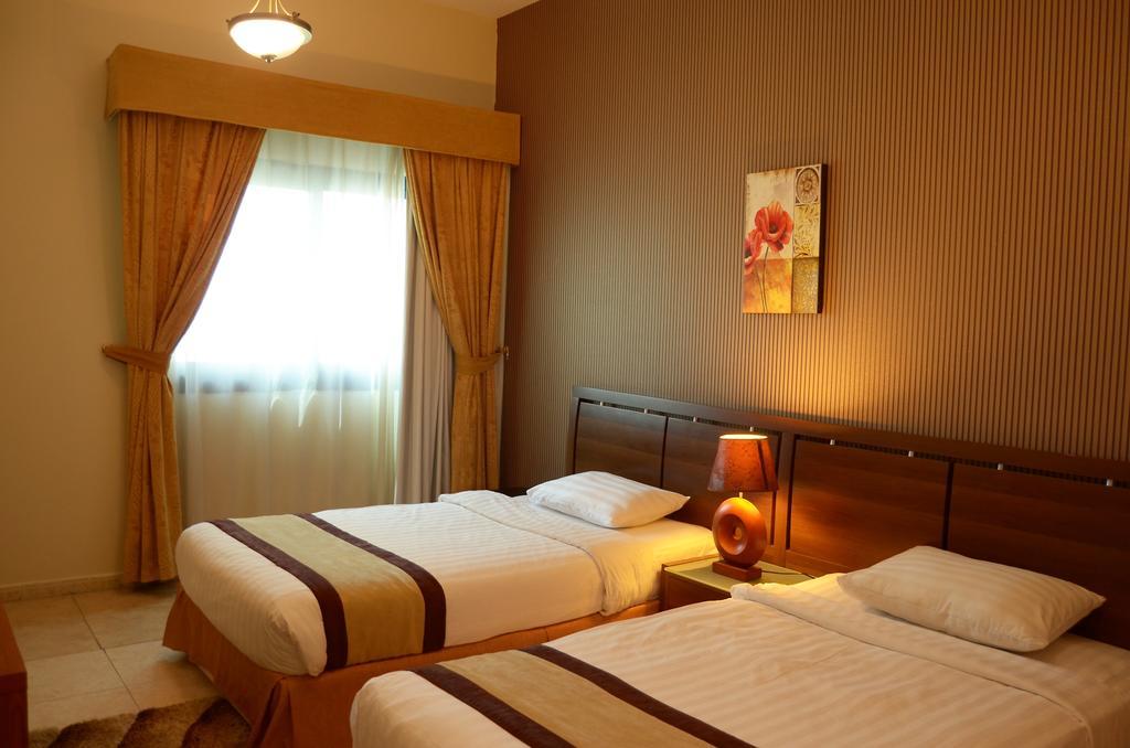 שארג'ה Arcadia Hotel Suites מראה חיצוני תמונה