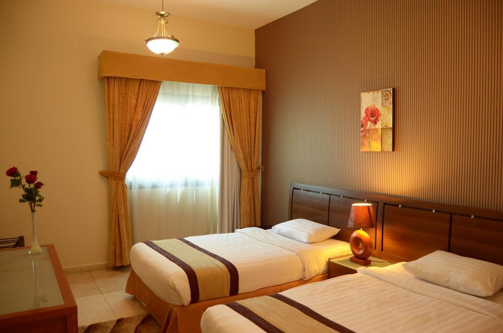 שארג'ה Arcadia Hotel Suites מראה חיצוני תמונה