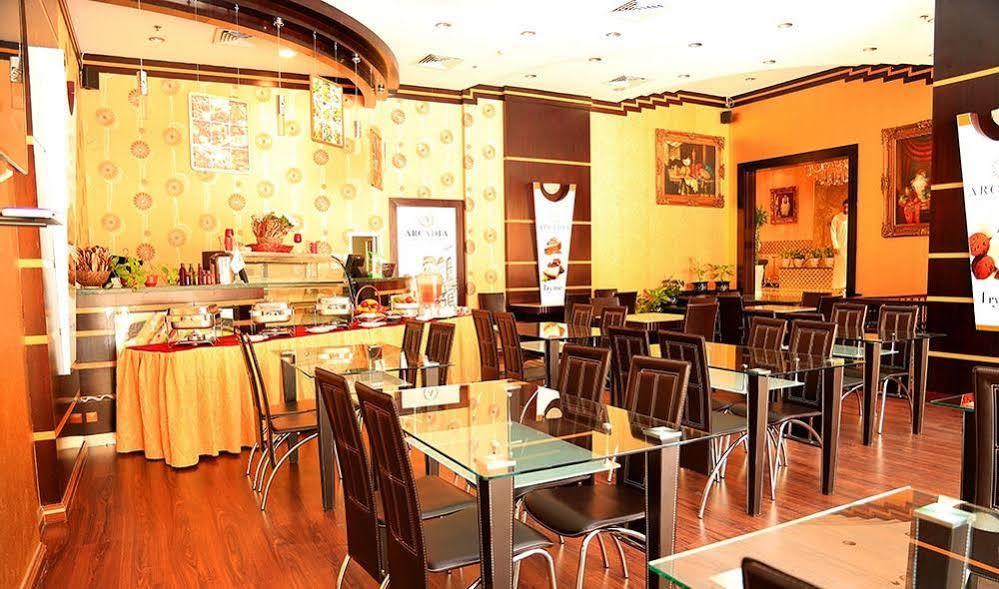 שארג'ה Arcadia Hotel Suites מראה חיצוני תמונה